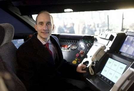 Lord Adonis at the controls of a Class 395 high-speed train