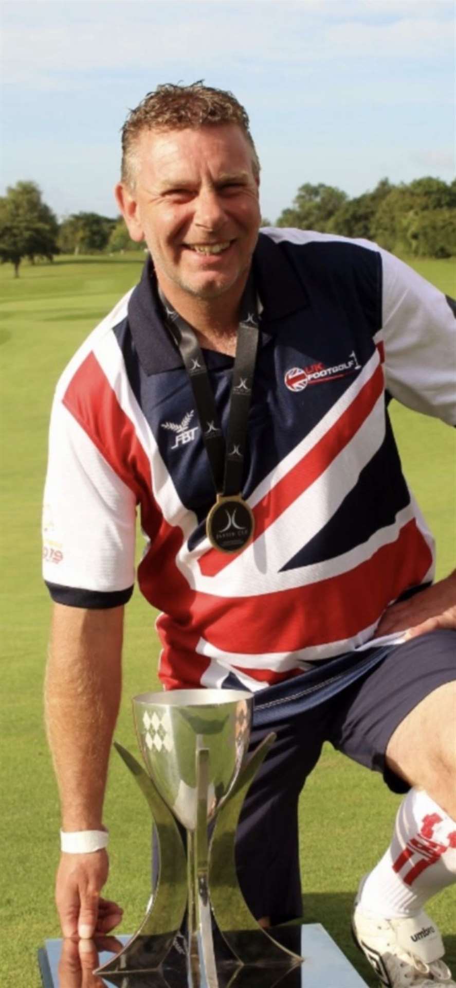 Chris Aldous with the Jansen Cup, the Ryder Cup of the footgolf world