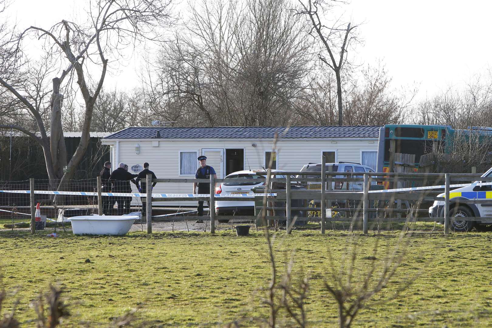 Officers carrying out their investigation at land next to Apple Oak Farm in Benover Road, Yalding