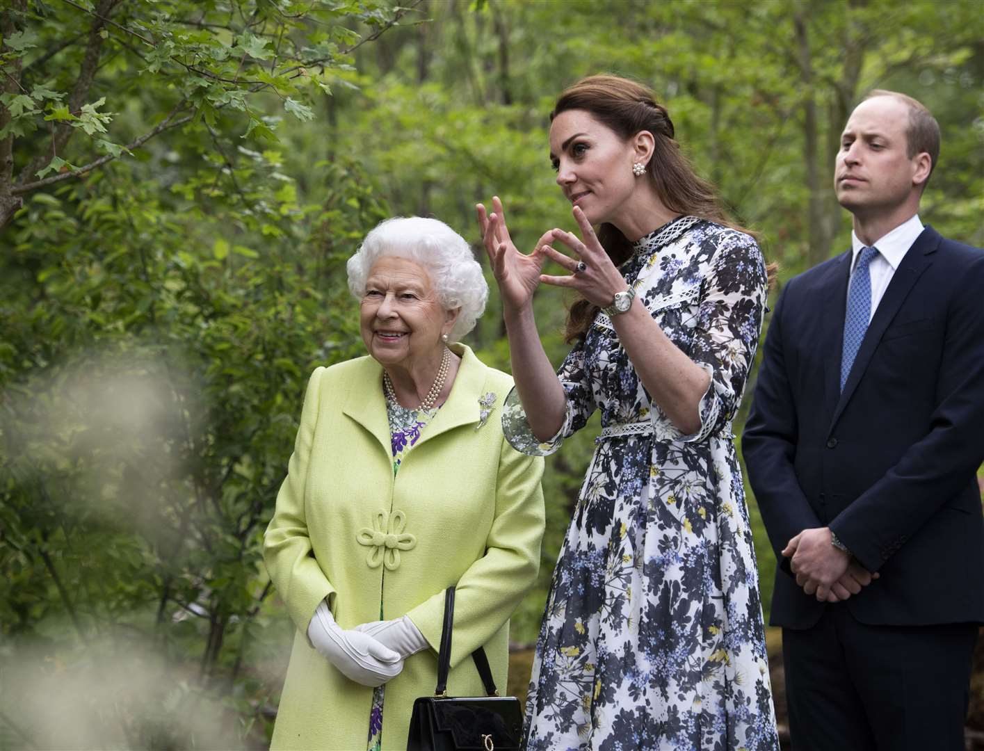 Queen Elizabeth II and the Duke and Duchess of Cambridge at the RHS Chelsea Flower Show last year. Photo: Geoff Pugh/PA Wire