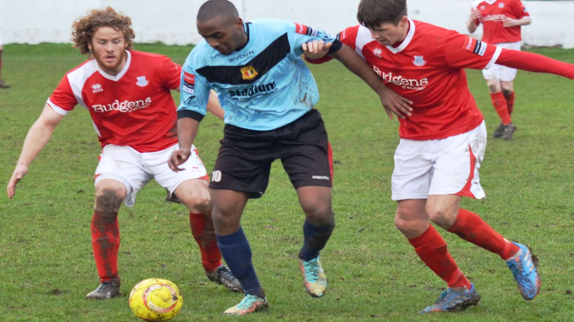 Adam Williams of Sittingbourne takes on two Whitstable players during his Brickies debut last weekend Picture: Ken Medwyn