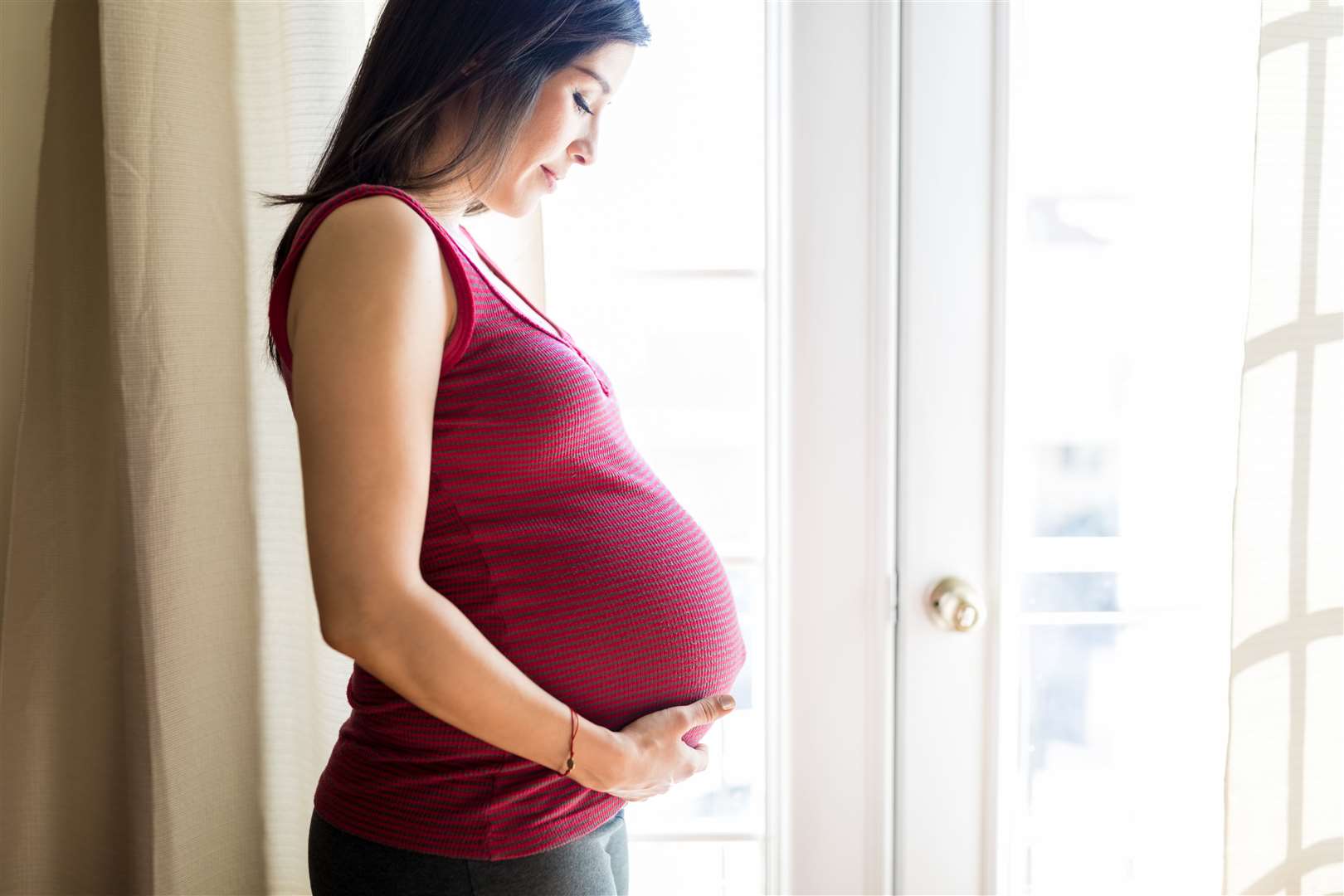 The medicines regulator says the Covid-19 jab remains safe for pregnant women and its advice hasn't changed. Image: iStock.
