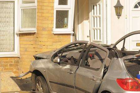 The pensioner's car smashed into the house in Brown Street Rainham. Picture by Steve Crispe
