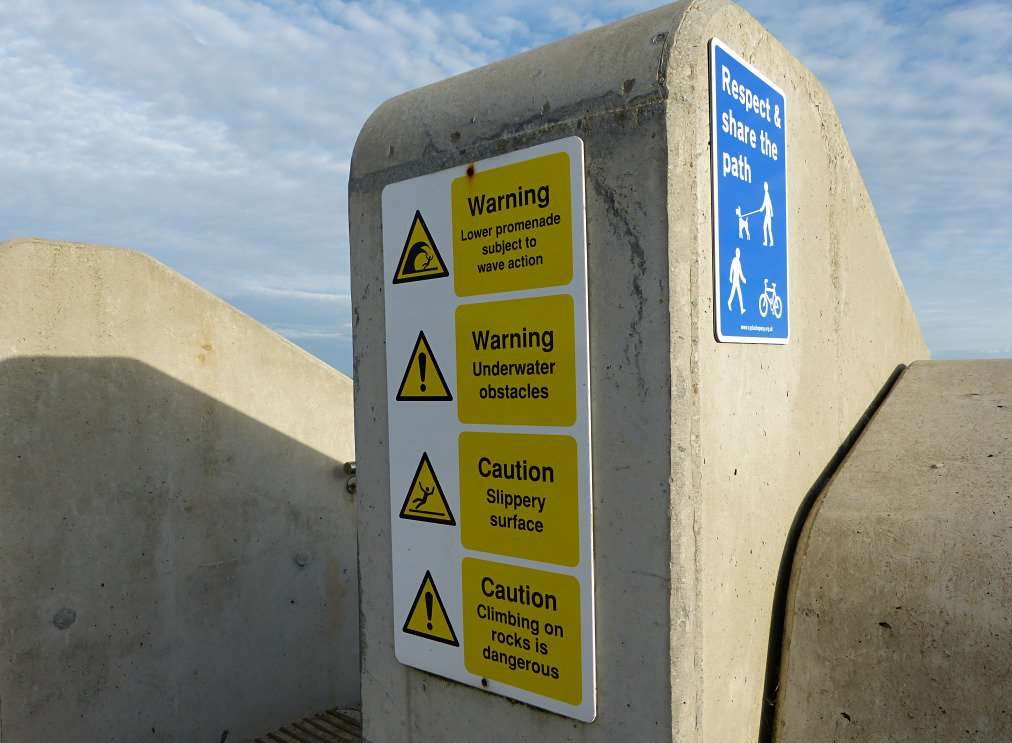 The three are just metres from warning signs. Picture: Kent999s