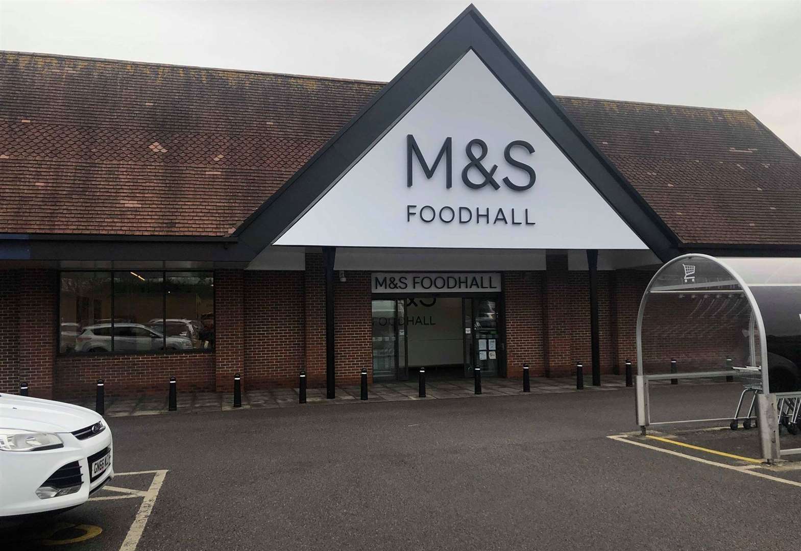 Man charged after M&S staff threatened with knife