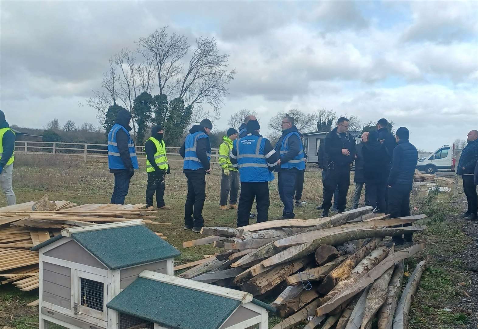 Traveller families fear eviction as enforcement officers tear down site