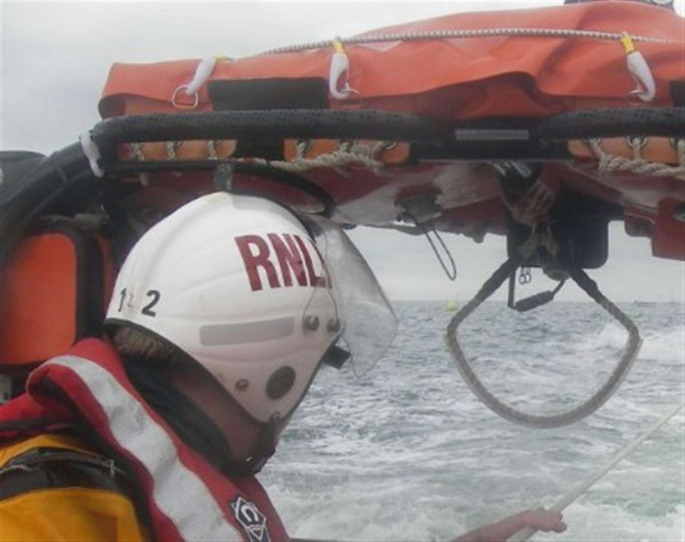 Sailor rescued after dinghy capsizes