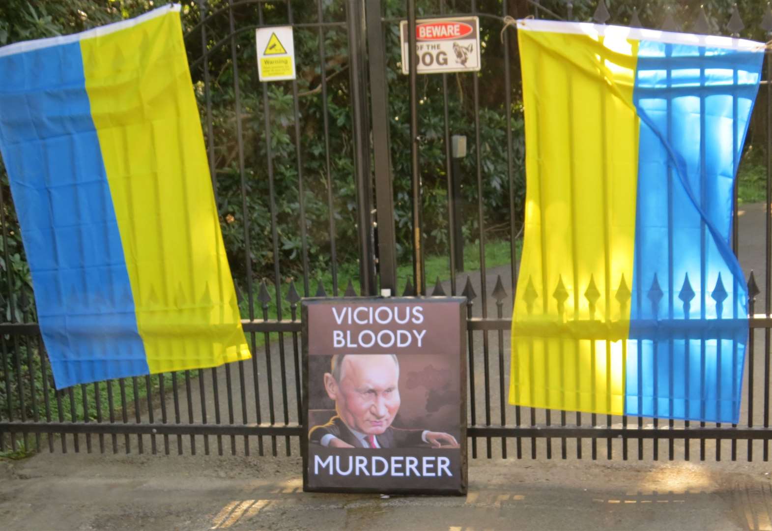 Protesters cover Russian embassy in Kent with Ukraine flags