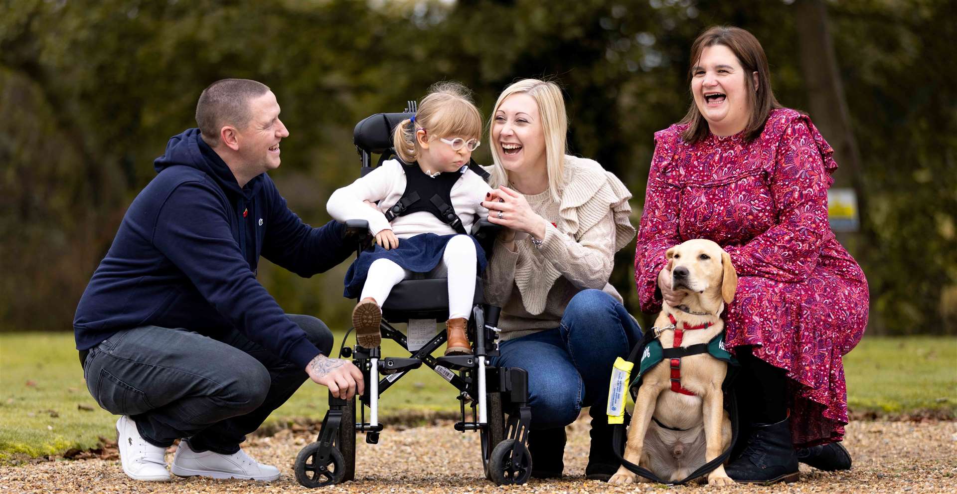 Adam, Amy Charlotte and Merlin with Charlotte Chaney from Supporting Paws. Picture: Tommy Reynolds/National Lottery