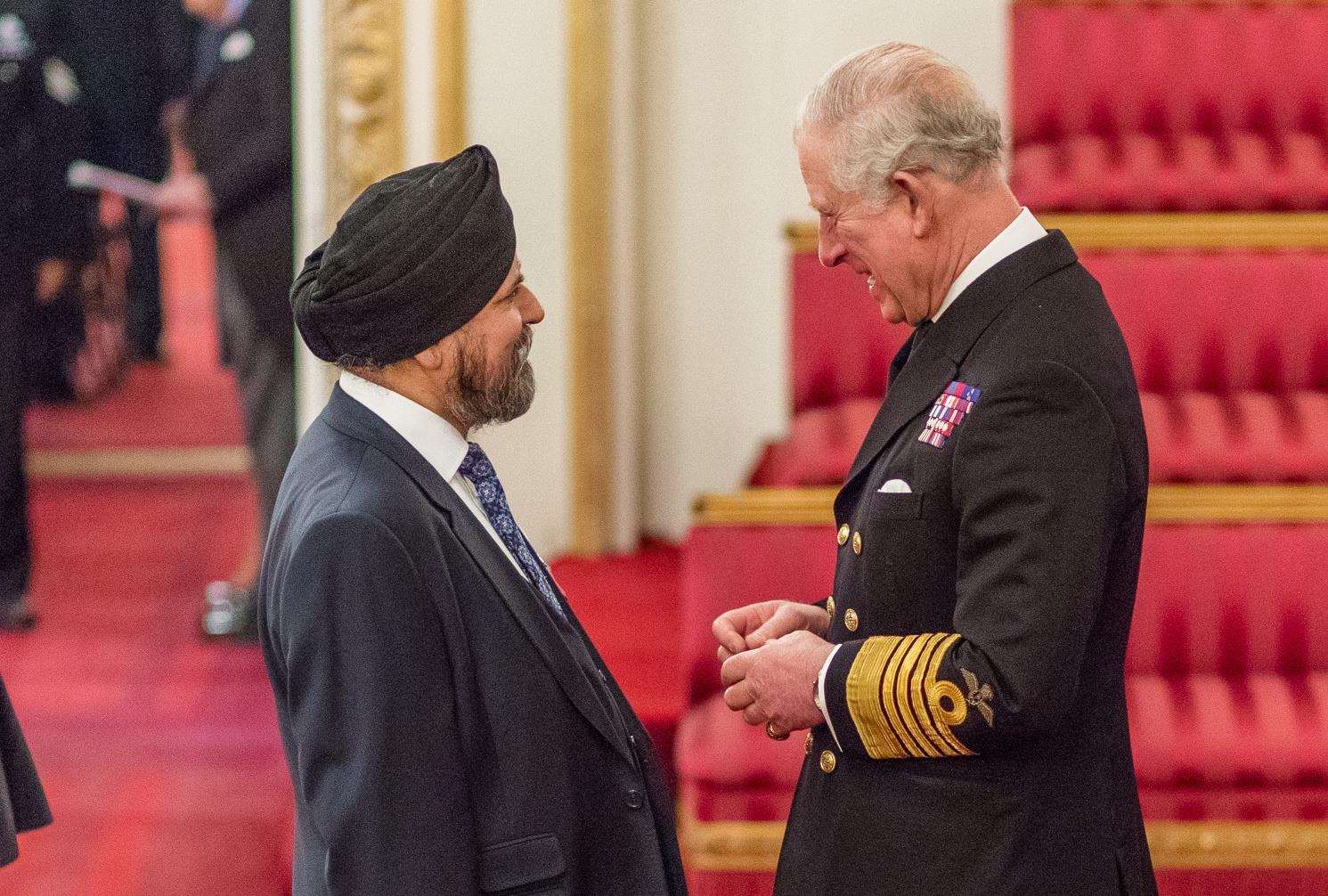 Jagdev Singh Virdee getting his MBE from Prince Charles (6326833)