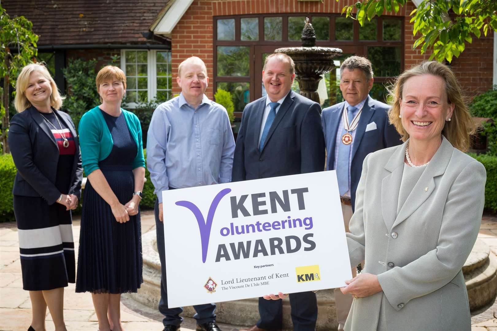 Geraldine Allison of the KM Media Group, front, with partner organisations celebrating the launch of the Kent Volunteering Awards 2019 at Hempstead House, Sittingbourne.