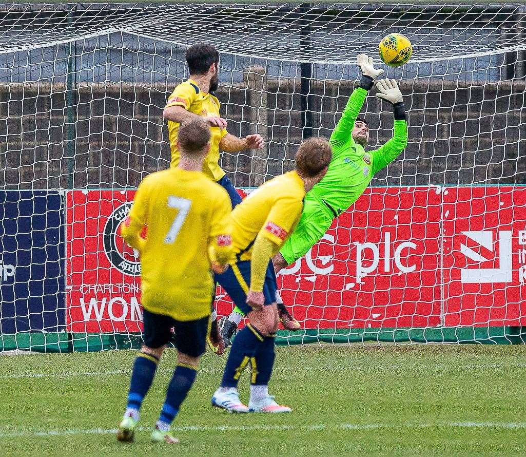 Whitstable goalkeeper Dan Eason makes a save during their 3-0 defeat at VCD last weekend. Picture: Les Biggs