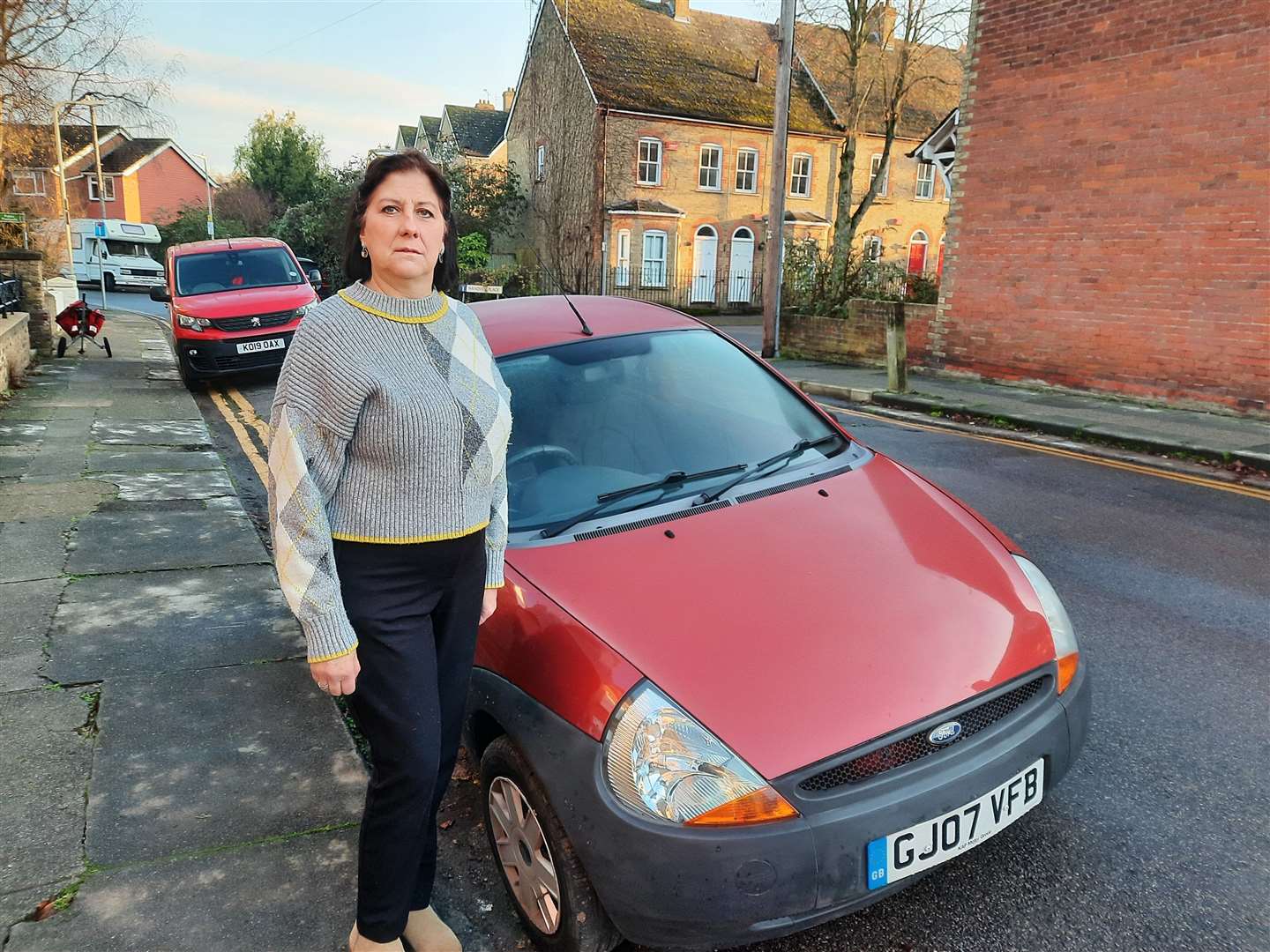 Catherine Caplan next to her Ford Ka in Kimberley Road, Canterbury