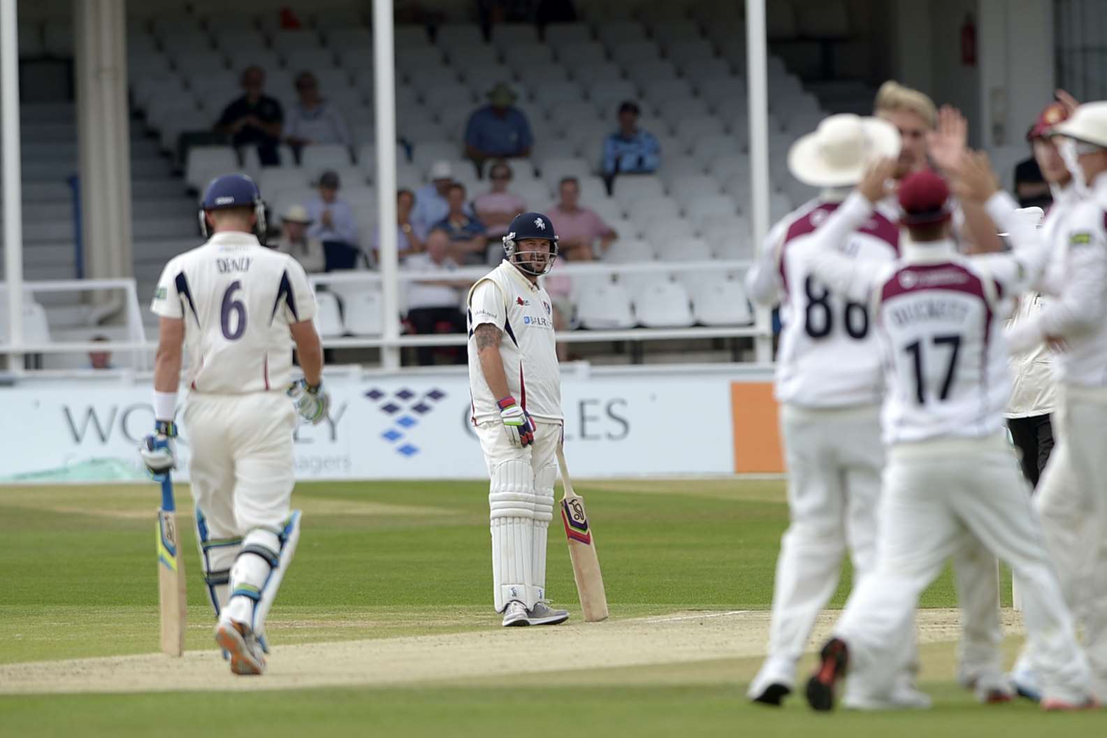 Darren Stevens looks on as Northants celebrate a wicket. Picture: Barry Goodwin