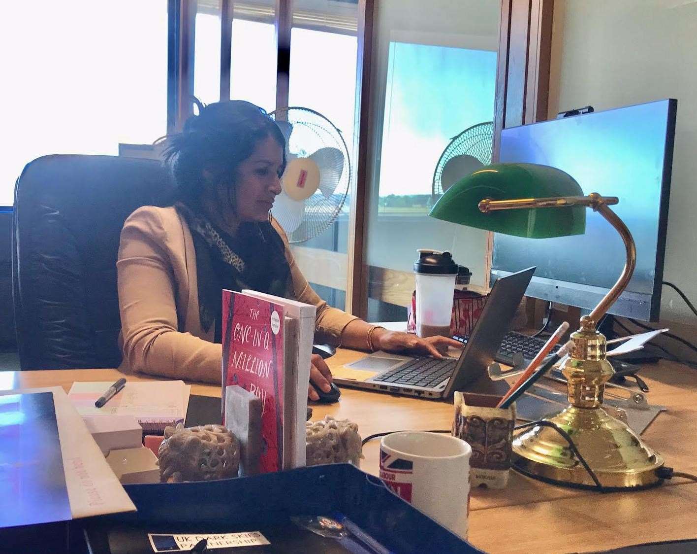 Naushabah Khan at her desk at the council's Gun Wharf HQ