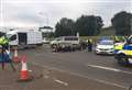 Arrests as Insulate Britain block the M25 and industrial estate