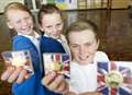 Pupils receive special Queen coins