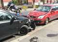 Biker airlifted to hospital after two car crash