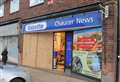 Four held after third raid on shop