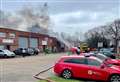 Explosions heard as 10 crews tackle huge industrial fire