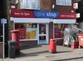 Staff threatened with axe in robbery
