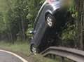 Video: Shocking moment car rolls down hill into tree