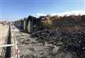 Beach huts destroyed in fire