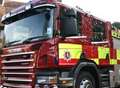 Man taken to hospital after rubbish fire