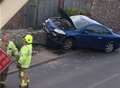 Car ploughs into stone wall