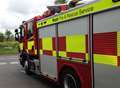 Man rescued from flat fire
