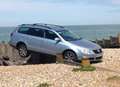'Runaway' car's dramatic balancing act