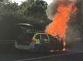 Police car bursts into flames on M20