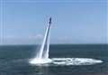 Beachgoers' delight at flying water stunt display