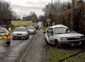 Woman trapped after road smash