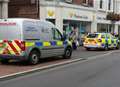 Man arrested after 'armed robbery' at travel agent