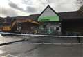 Store smashed by digger reopens