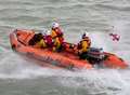 Woman 'in distress' rescued from sea