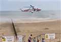 Rescue helicopter lands on beach to save swimmers
