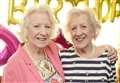 Identical twin sisters celebrate 90th birthday