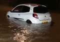 Cars stranded as floods hit