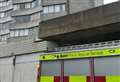Window pane falls from tower block 'narrowly missing man'