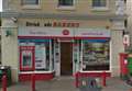 Post Office robber 'threatens woman with knife'