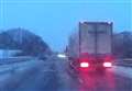 Dashcam films car skidding from motorway