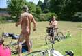 Naked cyclists pedal the environmental message