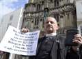 Hardline minister in cathedral protest