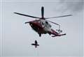 Coastguard helicopter helps with cliff rescue