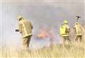 Firefighters tackle large grass fire