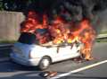 Driver lucky to escape blazing taxi