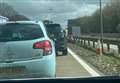M20 crash delays after man trapped in car