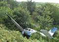 Three escape as light aircraft crashes